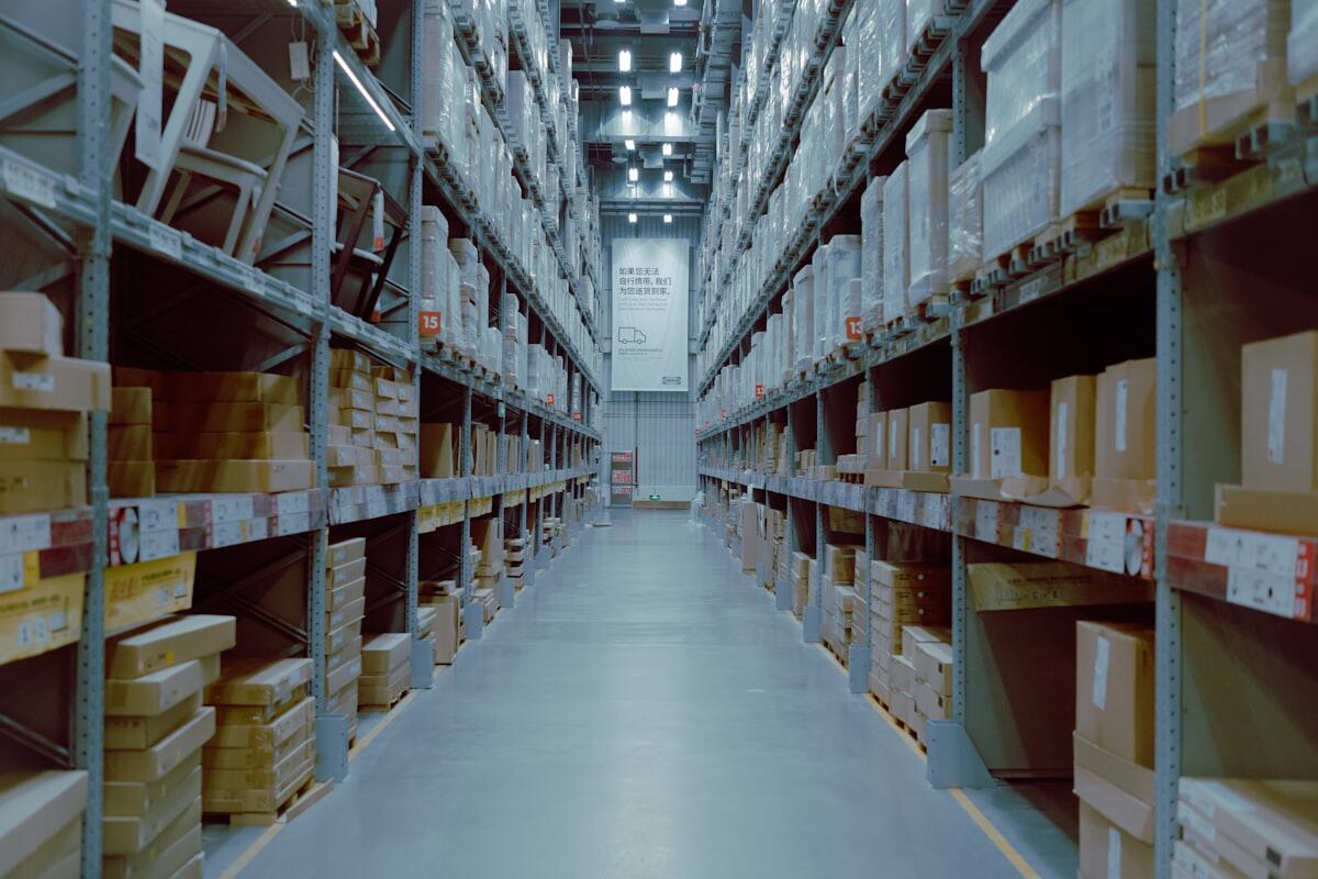 Cartons stored on warehouse pallet racking