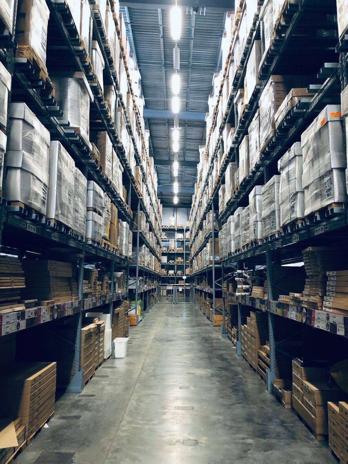 Long aisle of high pallet racking in a distribution warehouse